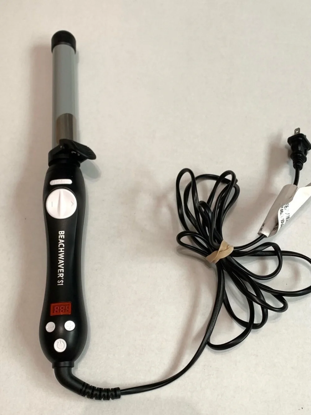 The Beachwaver Co. S1 Curling Wand in Black and Silver